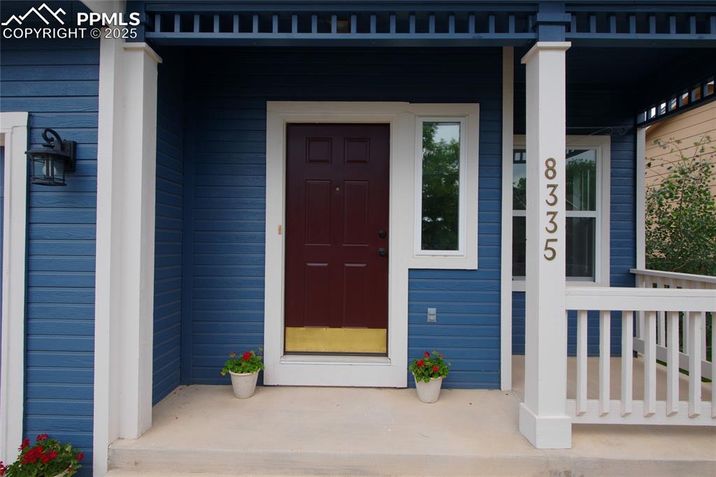 Image 4 of 44: Entrance to property featuring a porch
