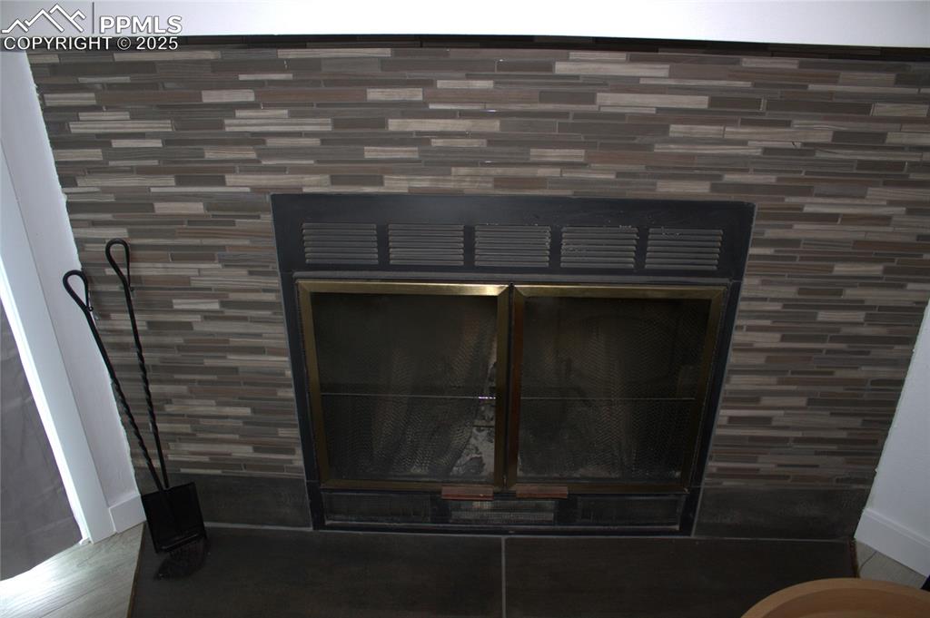 Image 5 of 38: Fireplace