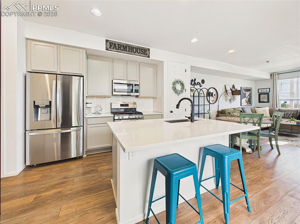 Image 14 of 50: Kitchen Island – Oversized center island with seating, pendant-ready design