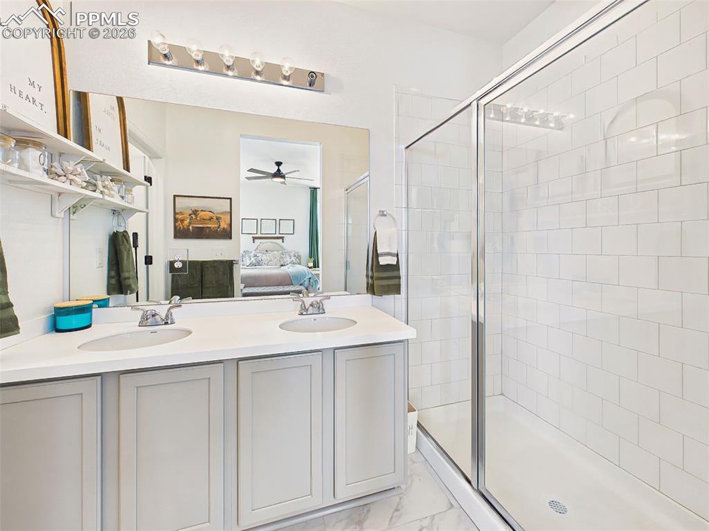 Image 27 of 50: Primary Bathroom – Spa-inspired primary bath with dual-sink vanity, oversiz