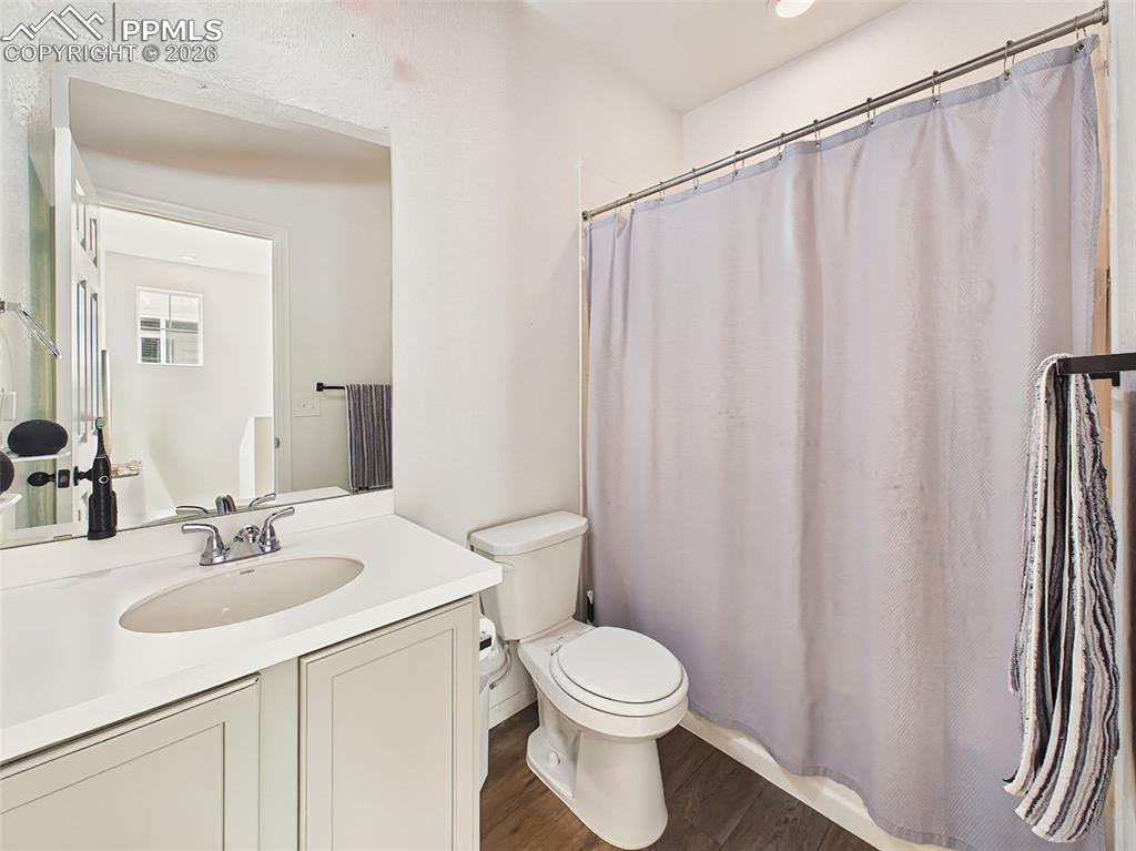 Image 33 of 50: Full Bathroom – Well-appointed secondary bathroom with vanity storage, full
