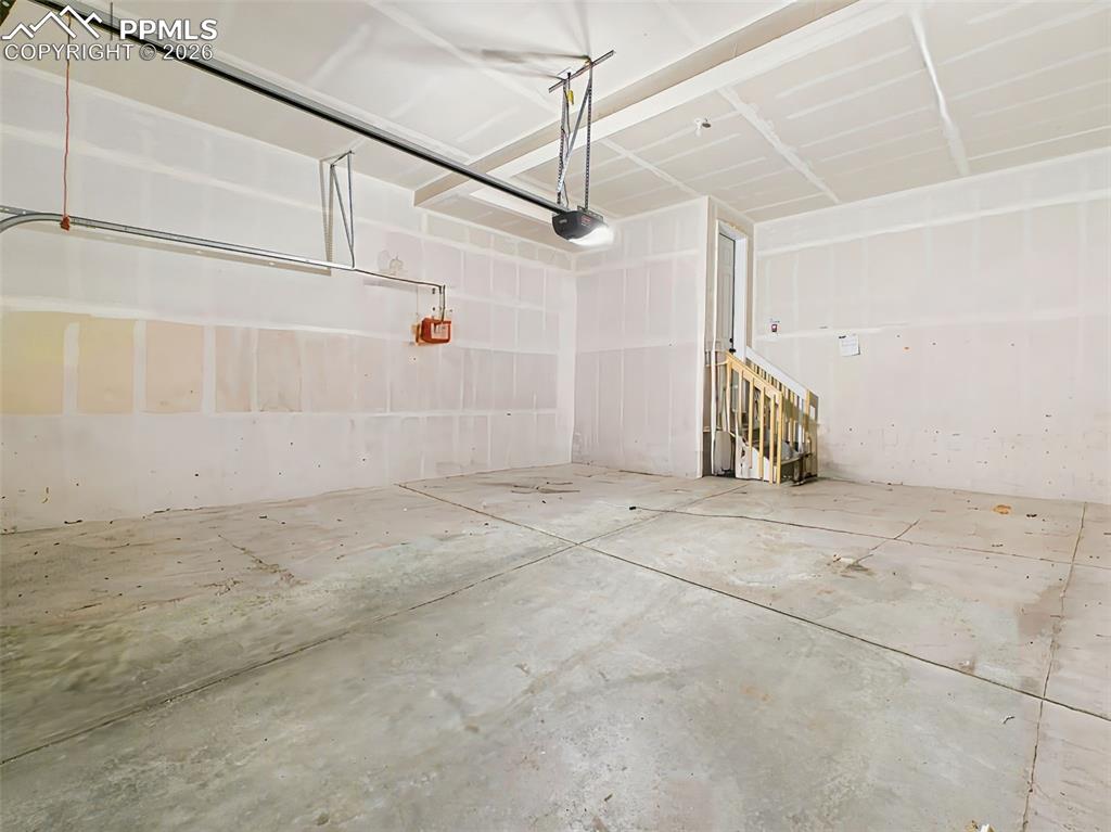 Image 44 of 50: Garage – Attached two-car garage offering secure parking and additional sto