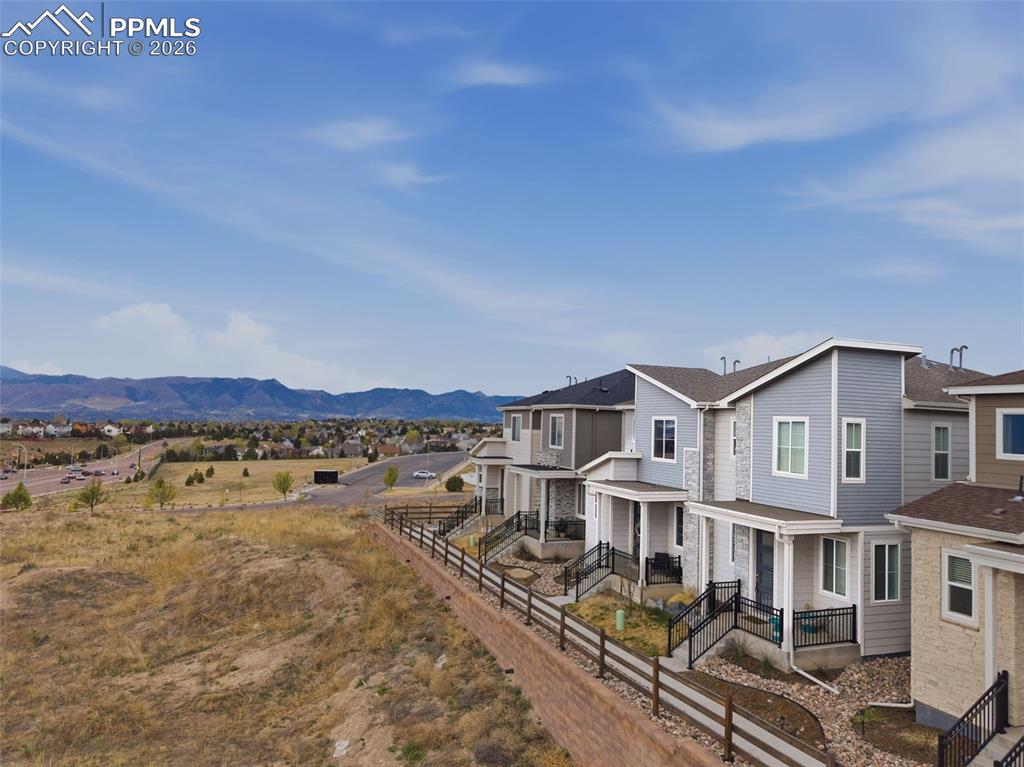 Image 48 of 50: Front Elevation – Beautiful curb appeal highlighted by stylish mixed-materi