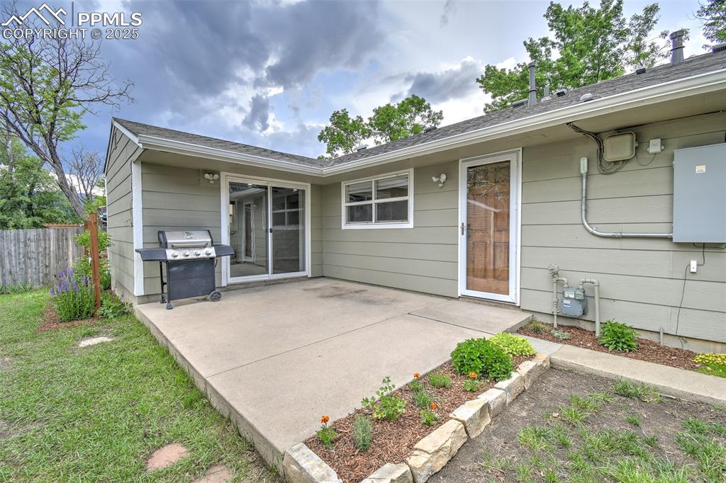 Image 19 of 25: View of patio / terrace with a grill