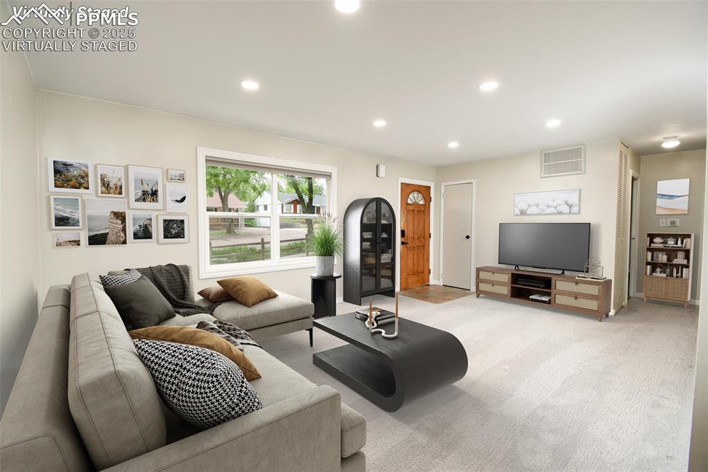 Image 3 of 25: Virtually Staged Living room featuring recessed lighting and carpet floors