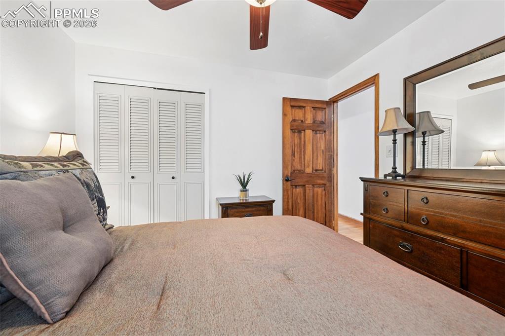 Image 42 of 46: Bedroom with a closet and ceiling fan