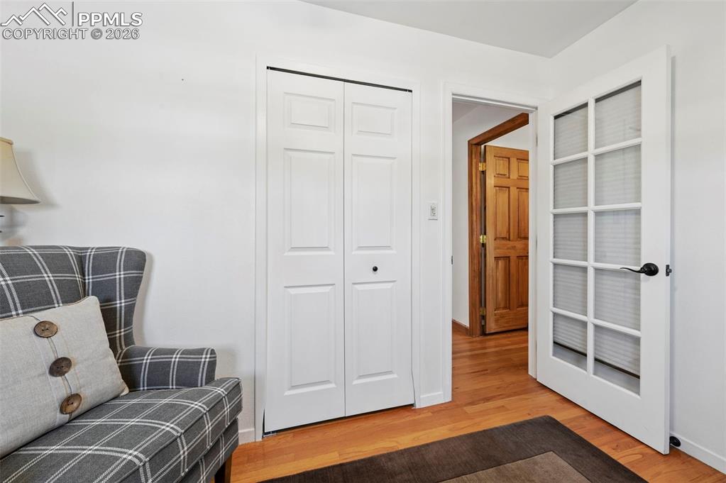 Image 46 of 46: Sitting room featuring light wood-type flooring and baseboards