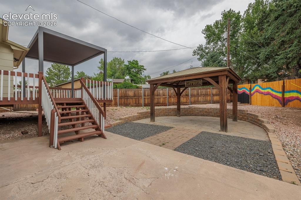 Image 33 of 41: Back Yard with Gazebo