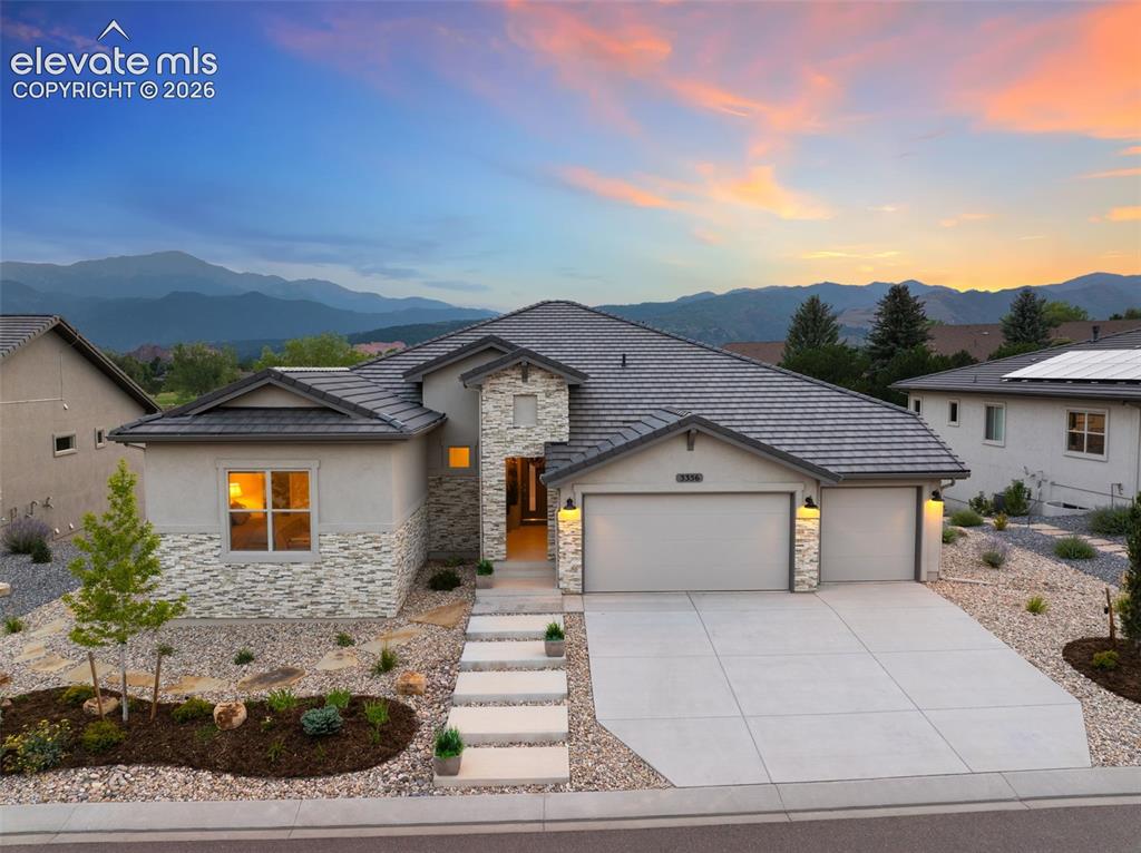Caption: Contemporary-style residence with spectacular mountain and Pikes Peak views.