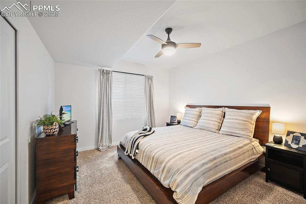 Image 37 of 41: Bedroom featuring carpet flooring and ceiling fan