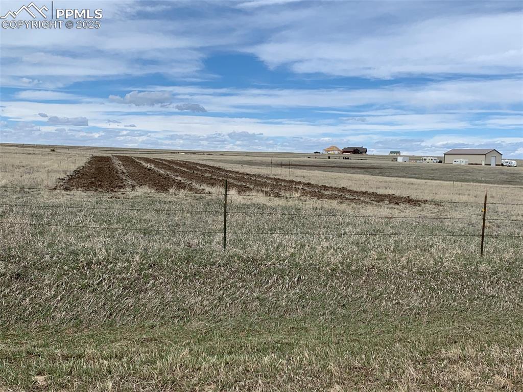 Image 3 of 3: View of yard featuring a rural view