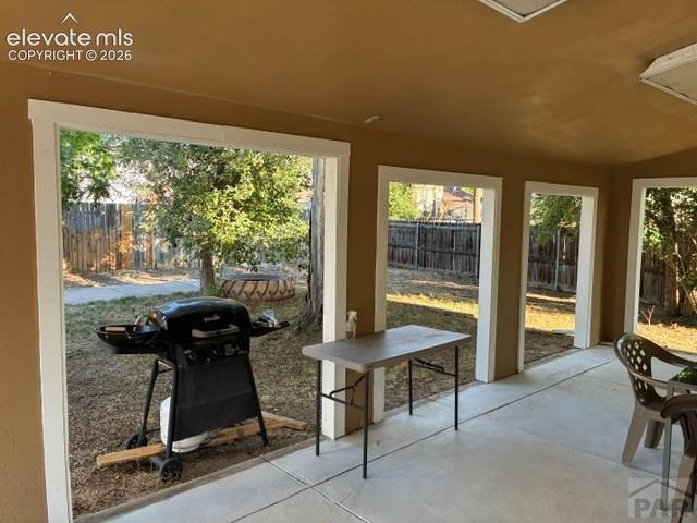 Image 16 of 19: Covered Patio