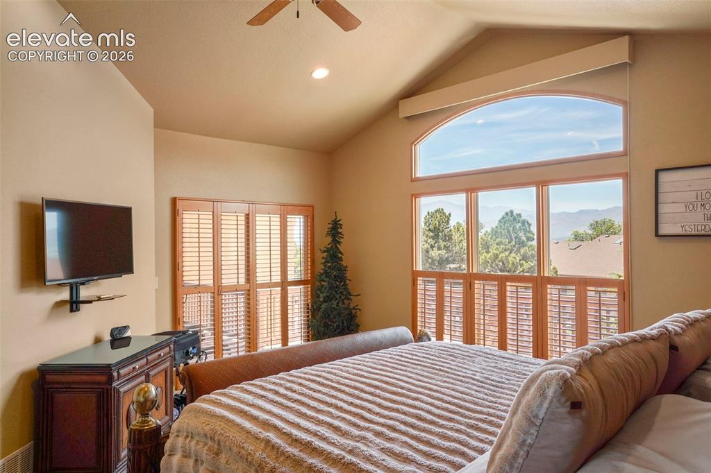Image 14 of 36: Amazing views and walkout to deck from primary bedroom