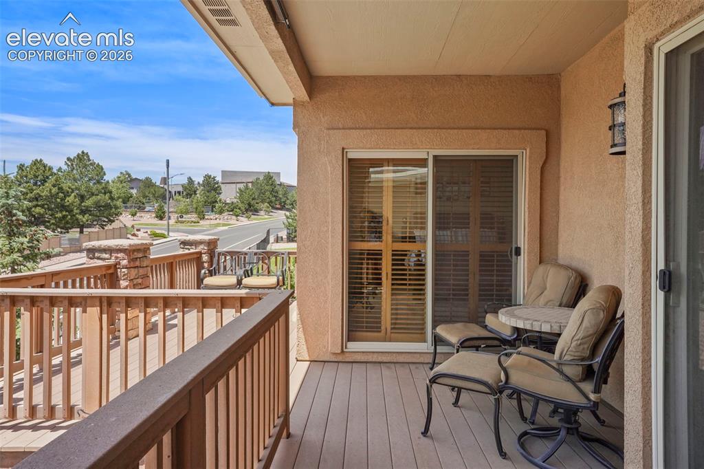 Image 16 of 36: Deck access to primary bedroom