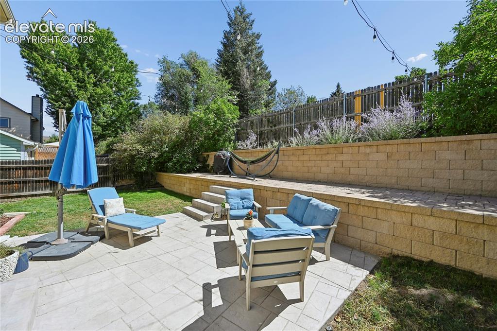 Image 15 of 48: Large patio in the back