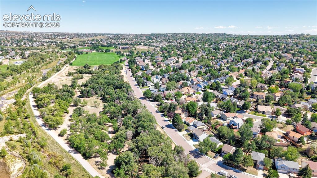 Image 38 of 48: Aerial View of Cottonwood Creek Park across the street and surrounding area