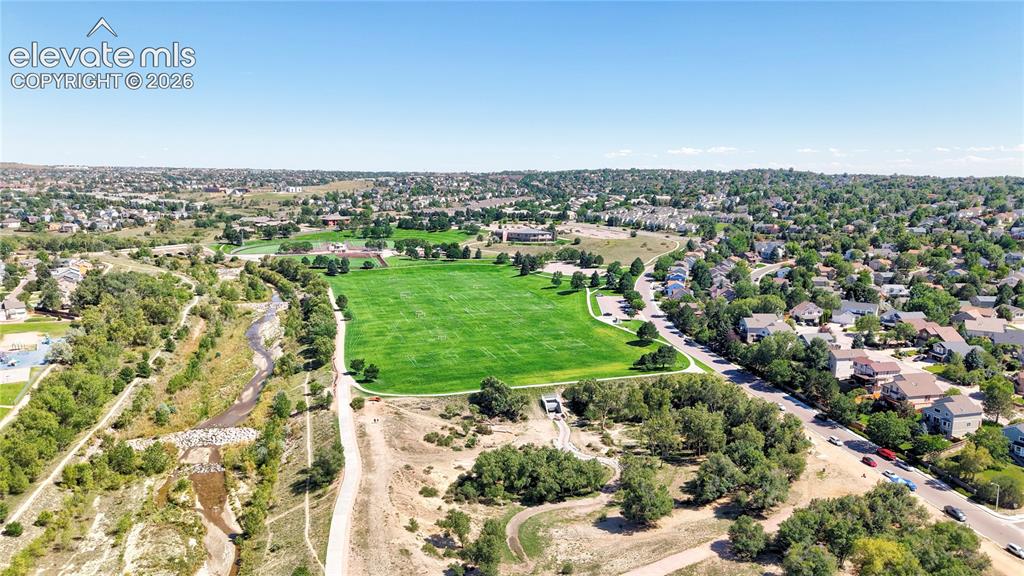 Image 42 of 48: Aerial View of Cottonwood Creek Park across the street from the house