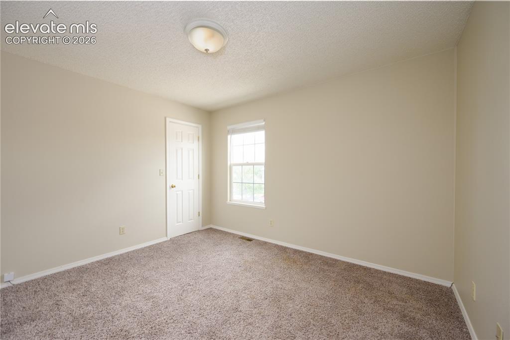Image 16 of 36: En Suite to primary bedroom for an office/nursery