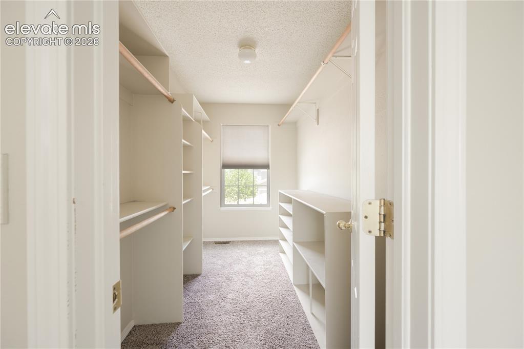 Image 17 of 36: Primary Closet
