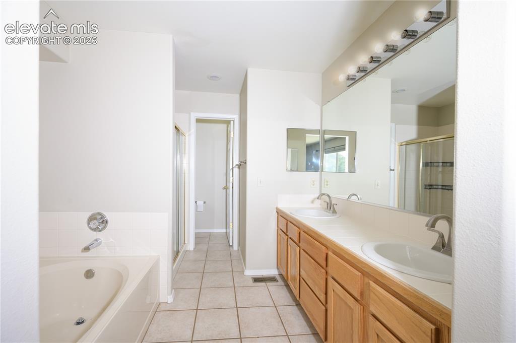 Image 19 of 36: Primary Bathroom