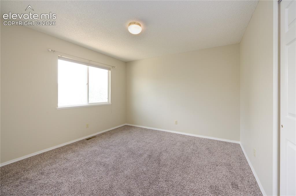 Image 22 of 36: Secondary #3 bedroom 