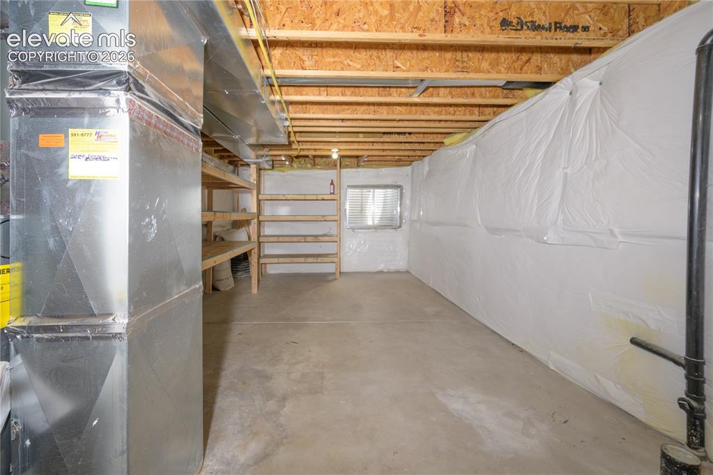 Image 27 of 36: Basement utility room preplumbed for bathroom