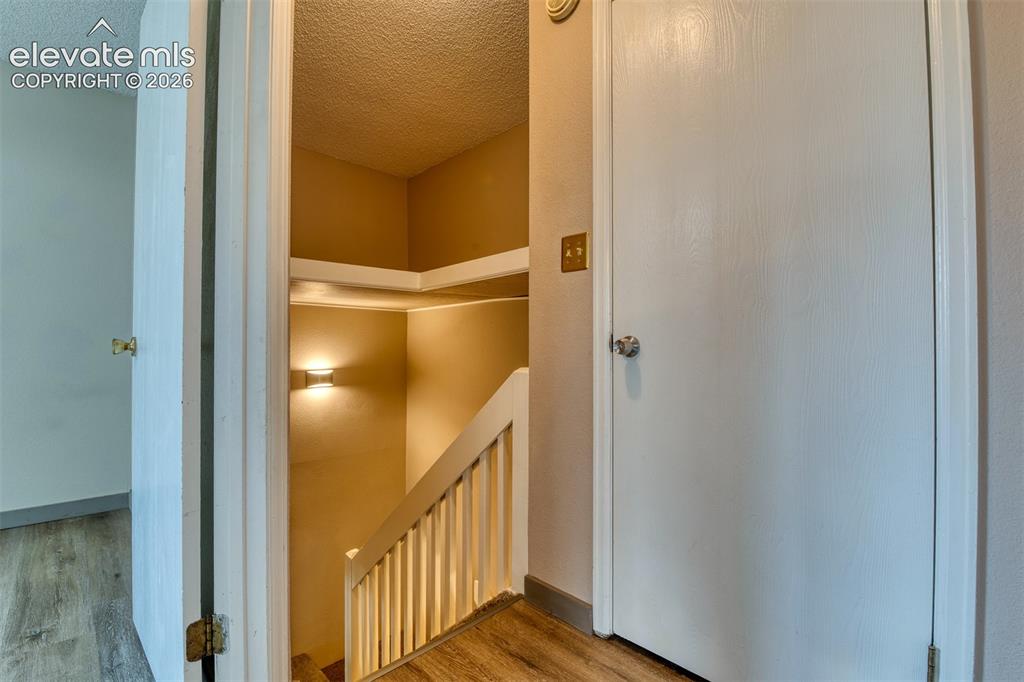 Image 16 of 31: Extra Storage above the stairs