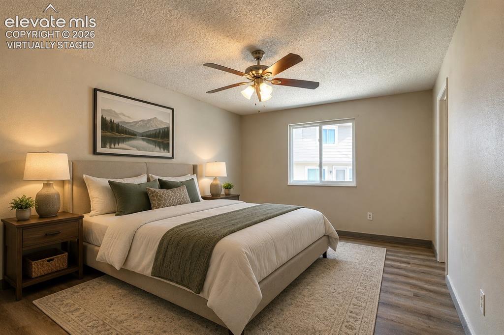 Image 18 of 31: "Virtually staged" owners bedroom