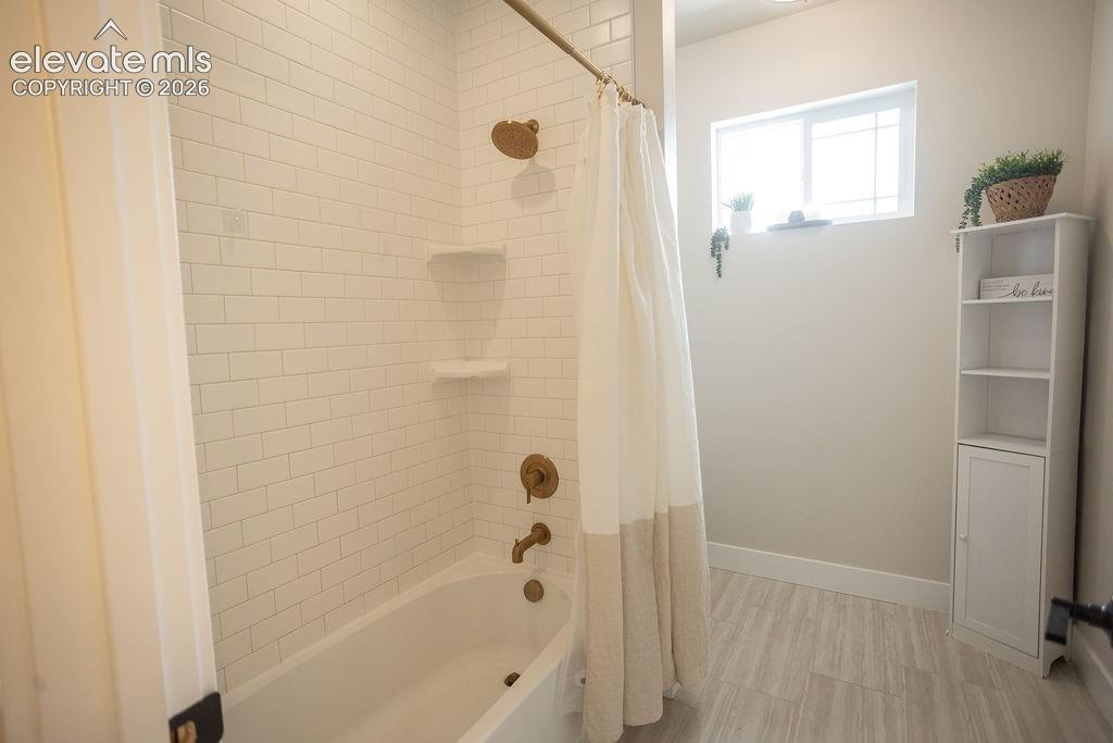 Image 27 of 42: Full upper bathroom with his/her sinks