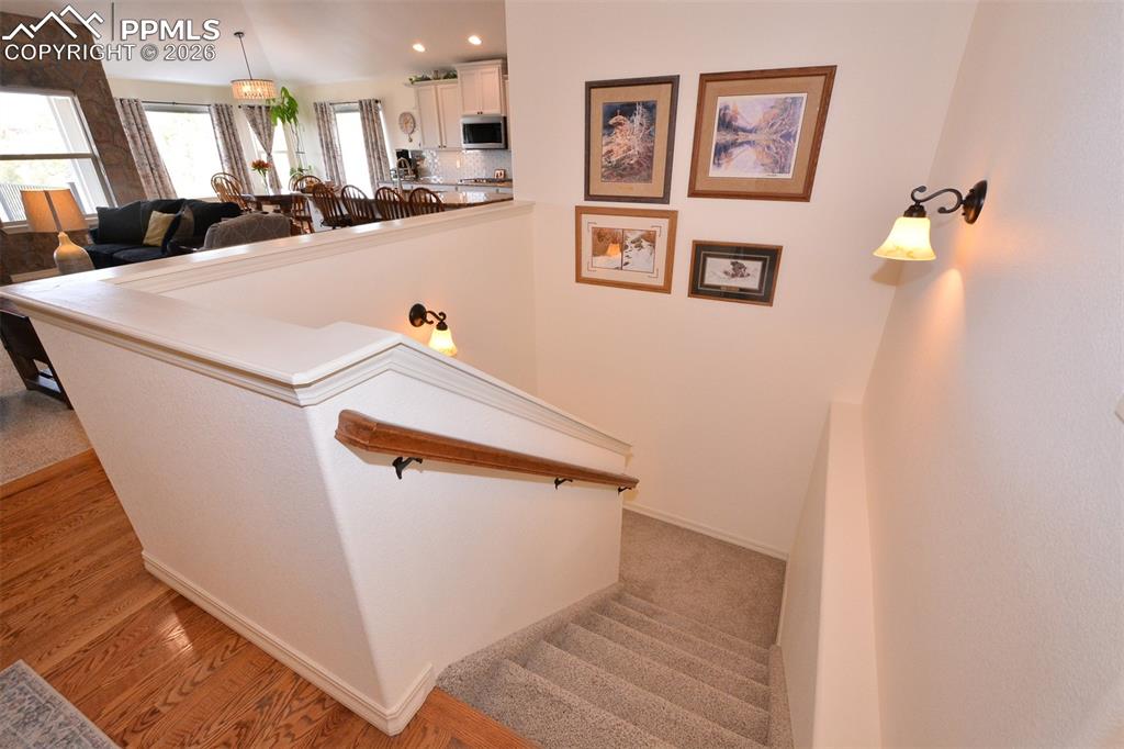 Image 20 of 43: Stairs to full finished basement