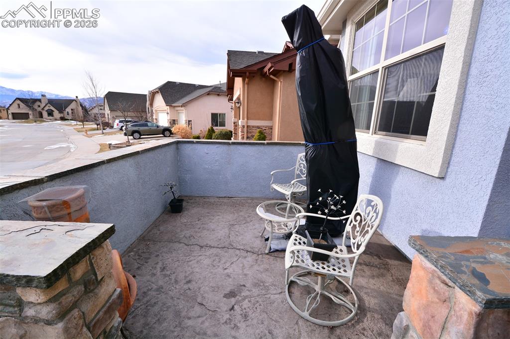 Image 3 of 43: Patio in front of home