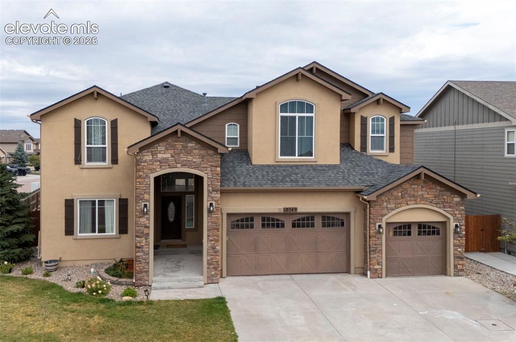 Image 1 of 49: Two-story on a fenced corner lot; new roof installed August 2026