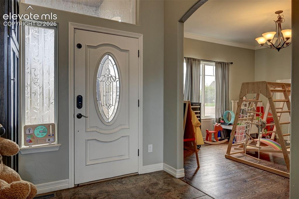 Image 4 of 49: Entry with tile floor