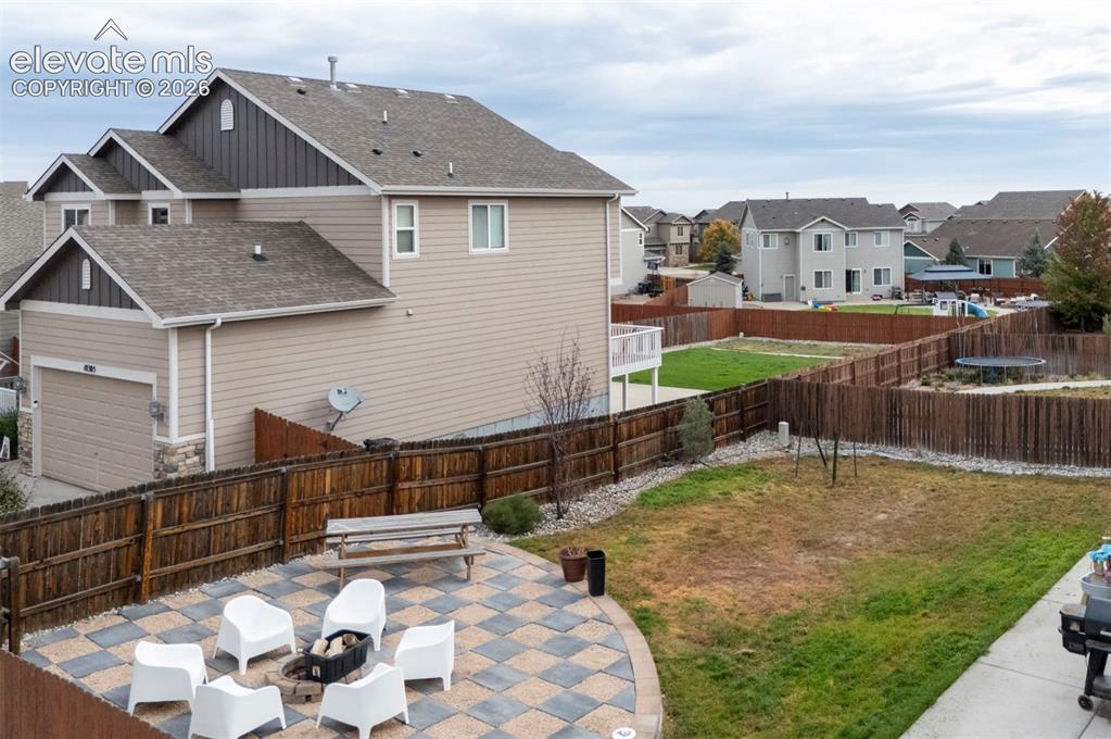 Image 43 of 49: Backyard and patio