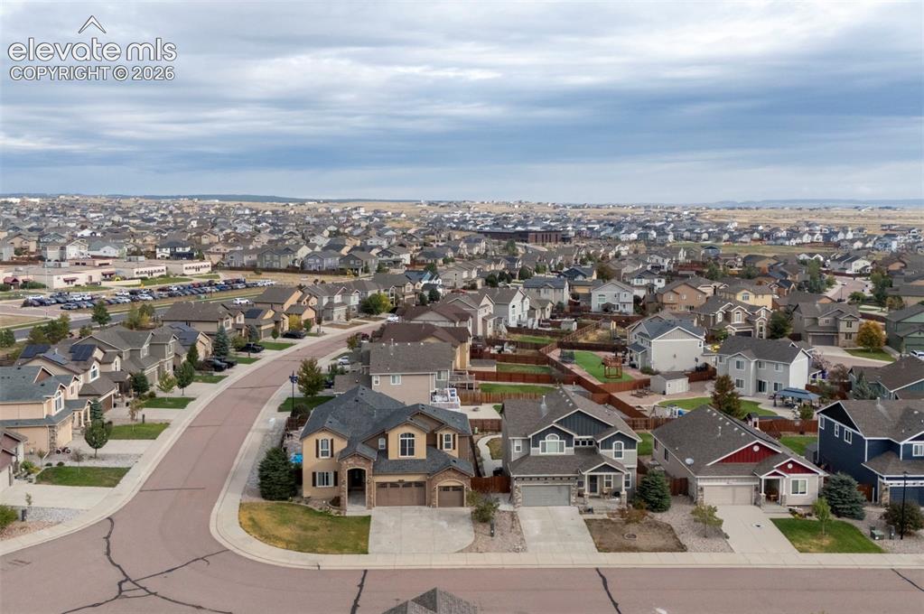 Image 45 of 49: Aerial view of the neighborhood
