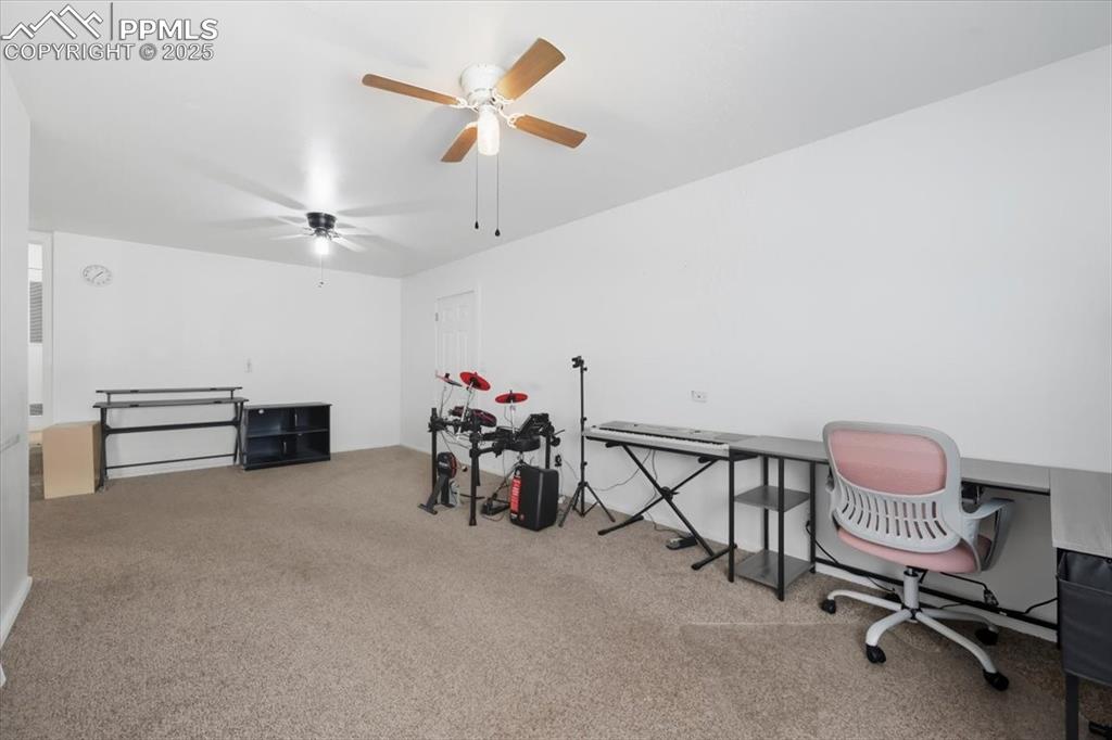 Image 35 of 45: Home office featuring carpet flooring and ceiling fan