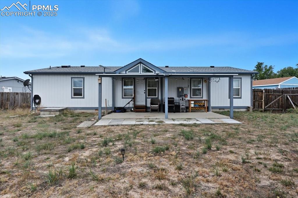 Image 40 of 45: Back of house featuring a patio area