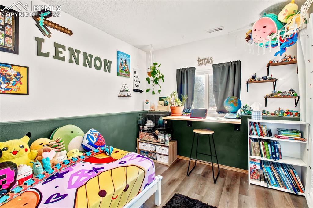 Image 19 of 35: Lower level bedroom