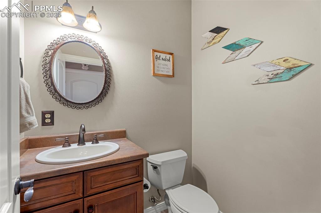 Image 14 of 41: Bathroom featuring vanity and toilet