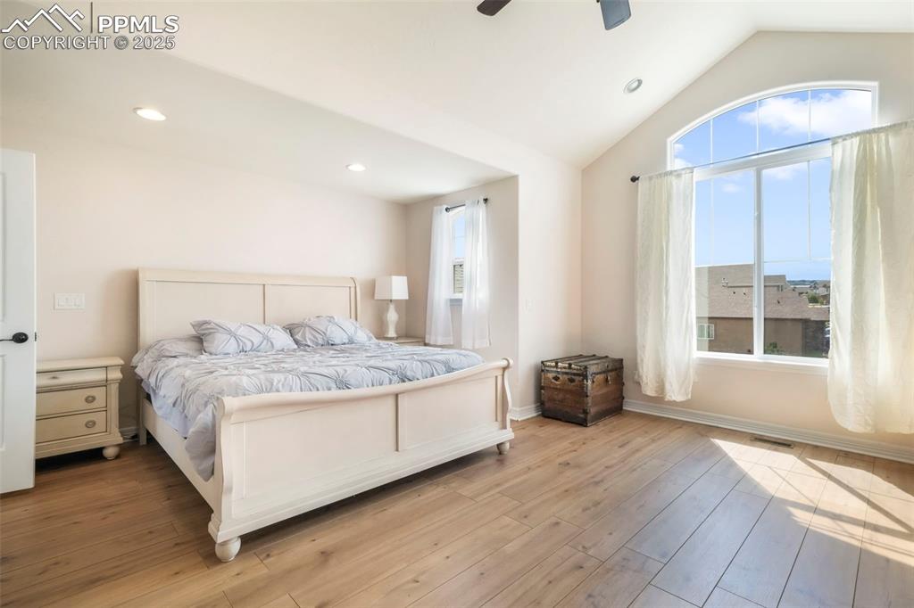 Image 22 of 50: Upper level primary bedroom with 5 piece bathroom and large walk in closet