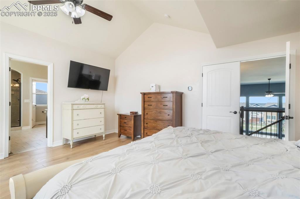 Image 23 of 50: Upper level primary bedroom with 5 piece bathroom and large walk in closet