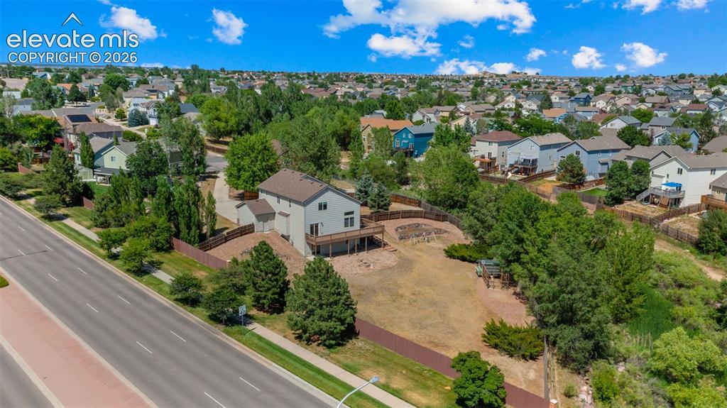 Image 42 of 50: Check out the size of this lot! Imagine adding a putting green, garden, or