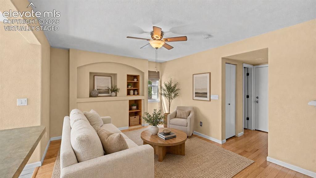 Image 9 of 50: Main floor family room off of kitchen. Virtually staged