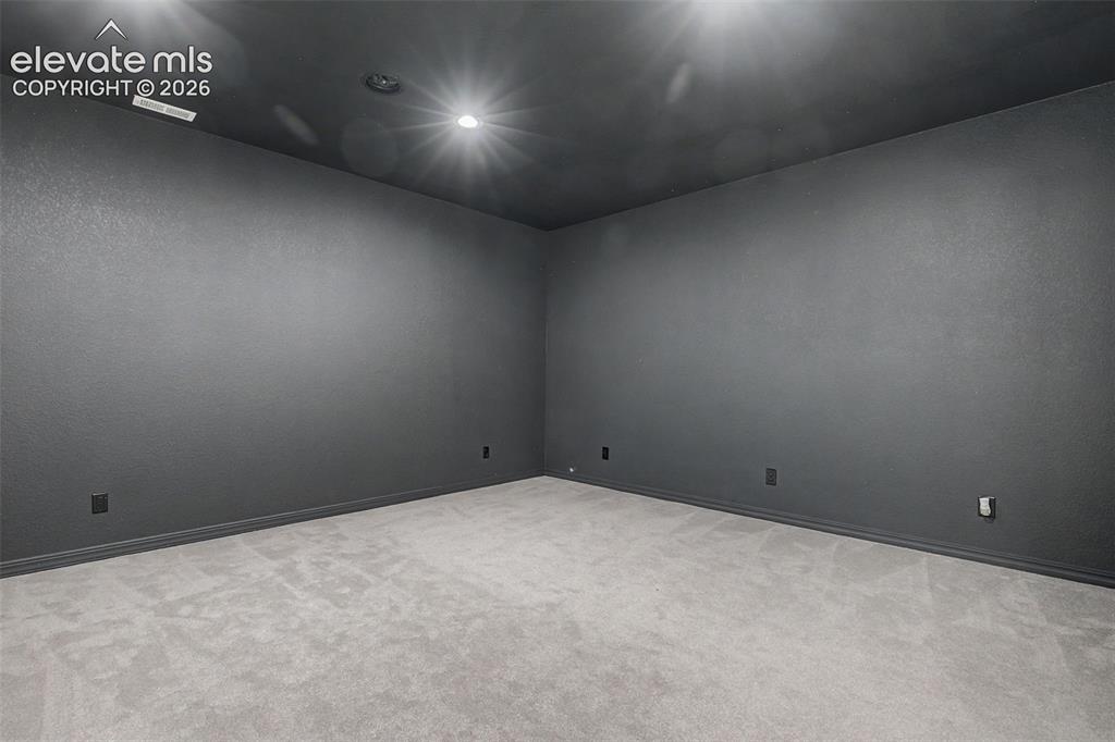 Image 43 of 50: Downstairs media room