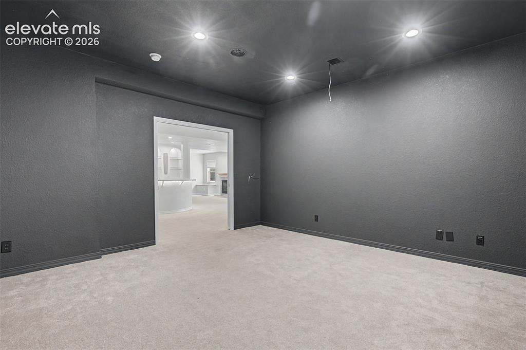 Image 44 of 50: Downstairs media room