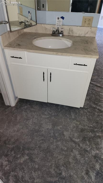 Image 10 of 29: Double vanities in primary bedroom