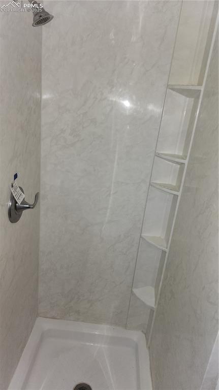 Image 12 of 29: Primary bath shower
