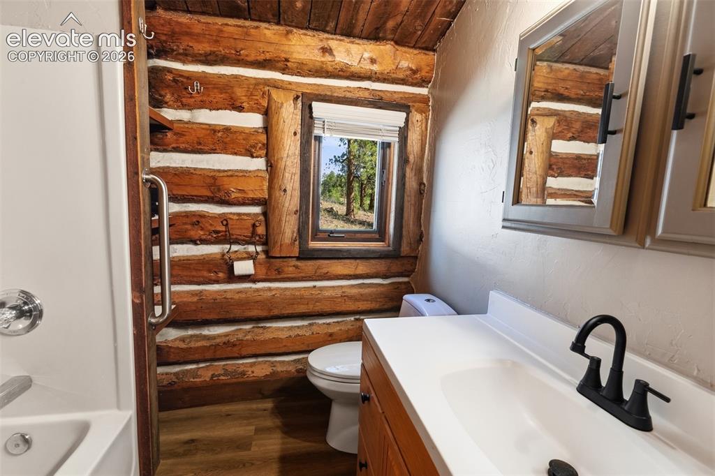 Image 14 of 49: Main House Bath