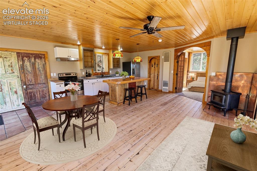 Image 22 of 49: Loft Apt Living & Kitchen - Virtually Staged