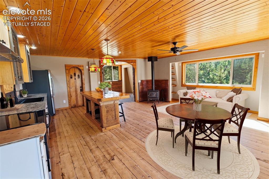 Image 23 of 49: Loft Apt Living & Kitchen - Virtually Staged